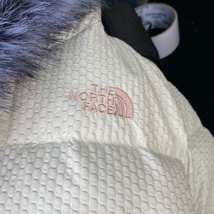 The North Face woman’s Lrg puffer coat